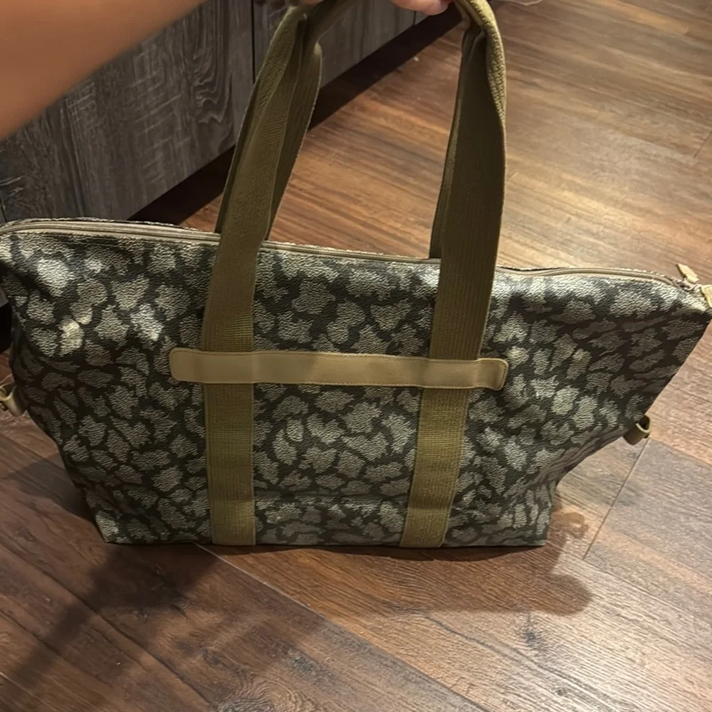 Yves Saint Laurent Pre Owned printed Signature Weekend Duffel Bag.